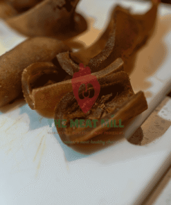 Brown Ponmo cooked in Nigerian Egusi soup