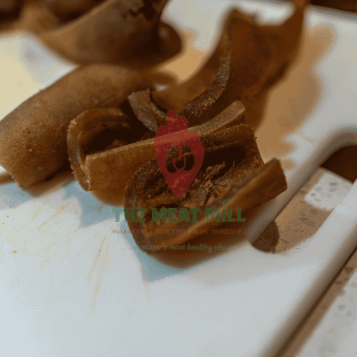 Brown Ponmo cooked in Nigerian Egusi soup